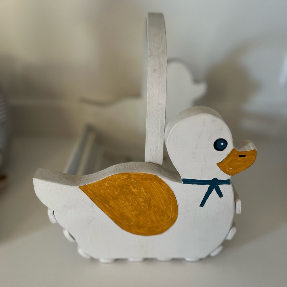 White hand painted duck basket.